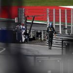 
              Mercedes driver George Russell of Britain walks back to his pits after he crashed into the track wall during a qualifying session at the Red Bull Ring racetrack in Spielberg, Austria, Friday, July 8, 2022. The Austrian F1 Grand Prix will be held on Sunday July 10, 2022. (Christian Bruna/Pool via AP)
            