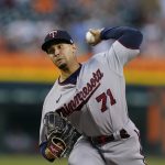 
              Minnesota Twins relief pitcher Jovani Moran throws during the eighth inning of a baseball game against the Detroit Tigers, Saturday, July 23, 2022, in Detroit. (AP Photo/Carlos Osorio)
            