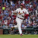 
              St. Louis Cardinals' Nolan Arenado celebrates after hitting a two-run home run during the third inning of a baseball game against the Los Angeles Dodgers Wednesday, July 13, 2022, in St. Louis. (AP Photo/Jeff Roberson)
            