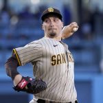 
              San Diego Padres starting pitcher Blake Snell throws to the plate during the first inning of a baseball game against the Los Angeles Dodgers Friday, July 1, 2022, in Los Angeles. (AP Photo/Mark J. Terrill)
            