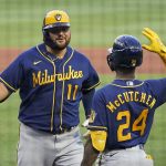 
              Milwaukee Brewers' Rowdy Tellez (11) celebrates with Andrew McCutchen after hitting a three-run home run off Pittsburgh Pirates starting pitcher Roansy Contreras during the second inning of a baseball game in Pittsburgh, Friday, July 1, 2022. (AP Photo/Gene J. Puskar)
            