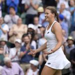 
              Germany's Jule Niemeier celebrates defeating Britain's Heather Watson in a women's fourth round singles match on day seven of the Wimbledon tennis championships in London, Sunday, July 3, 2022. (AP Photo/Kirsty Wigglesworth)
            