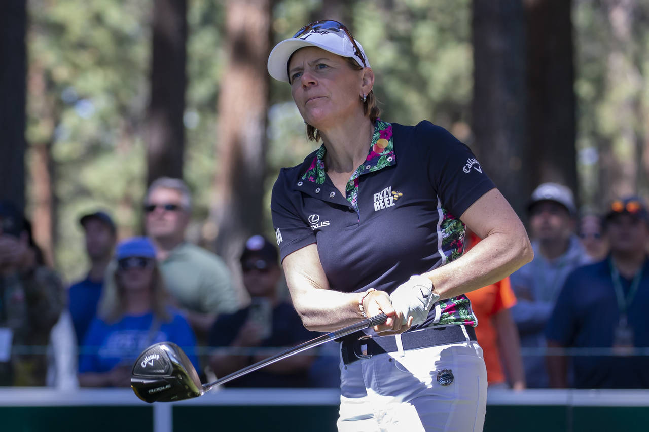 Annika Sorenstam watches a tee shot on the second hole during the first round of the American Centu...