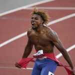 
              Noah Lyles, of the United States, celebrates after winning the men's 200-meter run final at the World Athletics Championships on Thursday, July 21, 2022, in Eugene, Ore. (AP Photo/Gregory Bull)
            