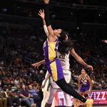 
              Los Angeles Sparks guard Jordin Canada (21) shoots next to Seattle Storm guard Briann January (20) during the second half of a WNBA basketball game Thursday, July 7, 2022, in Los Angeles. (Keith Birmingham/The Orange County Register via AP)
            