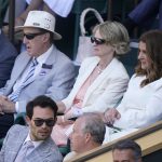 
              Melinda French Gates, top right, sits in the Royal Box on Centre Court to watch Serbia's Novak Djokovic and Britain's Cameron Norrie in a men's singles semifinal on day twelve of the Wimbledon tennis championships in London, Friday, July 8, 2022. (AP Photo/Gerald Herbert)
            