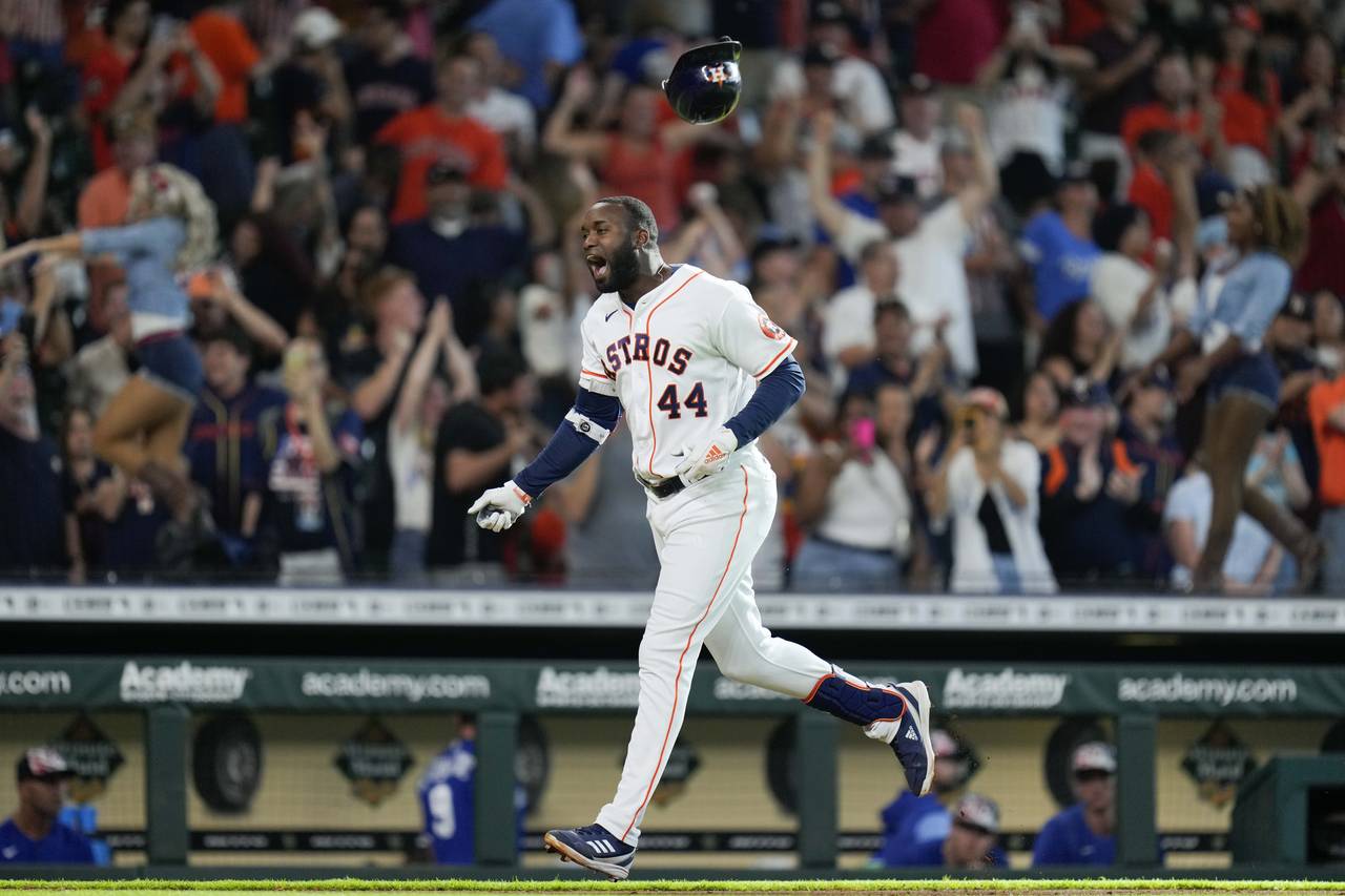 Houston Astros designated hitter Yordan Alvarez (44) celebrates after his walkoff home run during t...