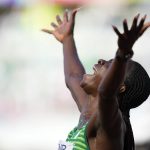 
              Tobi Amusan, of Nigeria, reacts after winning the women's 100-meter hurdles semifinal at the World Athletics Championships on Sunday, July 24, 2022, in Eugene, Ore. (AP Photo/Ashley Landis)
            