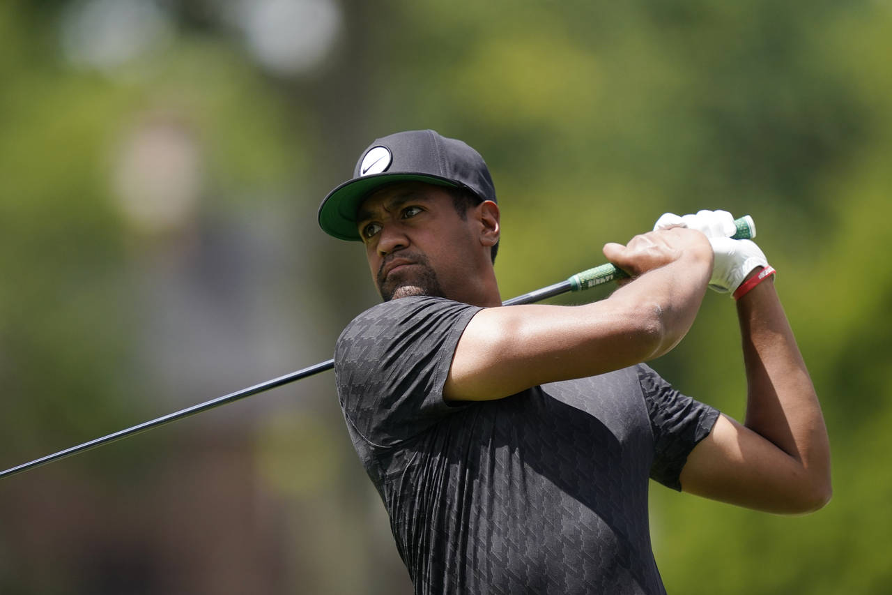 Tony Finau drives off the second tee during the third round of the Rocket Mortgage Classic golf tou...