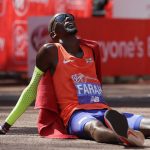 
              FILE - Britain's Mo Farah rests after crossing the finish line to place third in the Men's race in the London Marathon in central London, Sunday, April 22, 2018. It is hard to be first. Mo Farah this week went from being a gold medal-winning runner to the most prominent person ever to come forward as a victim of people trafficking. The four-time Olympic champion’s decision to tell the story of how he was exploited as a child gives a face to the often faceless victims of modern slavery, highlighting a crime that is often conflated with illegal immigration.   (AP Photo/Kirsty Wigglesworth, FILE)
            