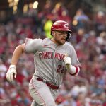 
              Cincinnati Reds' Brandon Drury doubles during the first inning of a baseball game Friday, July 15, 2022, in St. Louis. (AP Photo/Jeff Roberson)
            