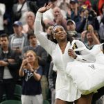 
              Serena Williams of the US waves as she leaves the court after losing to France's Harmony Tan in a first round women's singles match on day two of the Wimbledon tennis championships in London, Tuesday, June 28, 2022. (AP Photo/Alberto Pezzali)
            