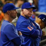 
              New York Mets manager Buck Showalter, center, reacts while watching his team play during the seventh inning of a baseball game against the San Diego Padres, Saturday, July 23, 2022, in New York. (AP Photo/Frank Franklin II)
            