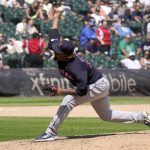 
              Cleveland Guardians relief pitcher Emmanuel Clase delivers during the ninth inning of the first game of a baseball doubleheader against the Chicago White Sox, Saturday, July 23, 2022, in Chicago. (AP Photo/Charles Rex Arbogast)
            