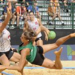 
              German beach handball player Isabel Kattner shoots against American defender Cedar Bellows at The World Games in Birmingham, Ala., on Wednesday, July 13, 2022. The 11-day, Olympic-style competition is being held in the United States for only the second time, at venues throughout Birmingham, Ala. (AP Photo/Jay Reeves)
            