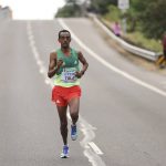 
              Tamirat Tola, of Ethiopia, competes during the men's marathon at the World Athletics Championships Sunday, July 17, 2022, in Eugene, Ore. (Patrick Smith/Pool Photo via AP)
            