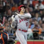 
              Los Angeles Angels' Shohei Ohtani (17) reacts after fouling a pitch against the Houston Astros during the sixth inning of a baseball game Saturday, July 2, 2022, in Houston. (AP Photo/David J. Phillip)
            
