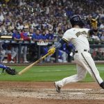 
              Milwaukee Brewers' Victor Caratini hits a walk off three run home run during the 10th inning of a baseball game against the Chicago Cubs Monday, July 4, 2022, in Milwaukee. (AP Photo/Morry Gash)
            