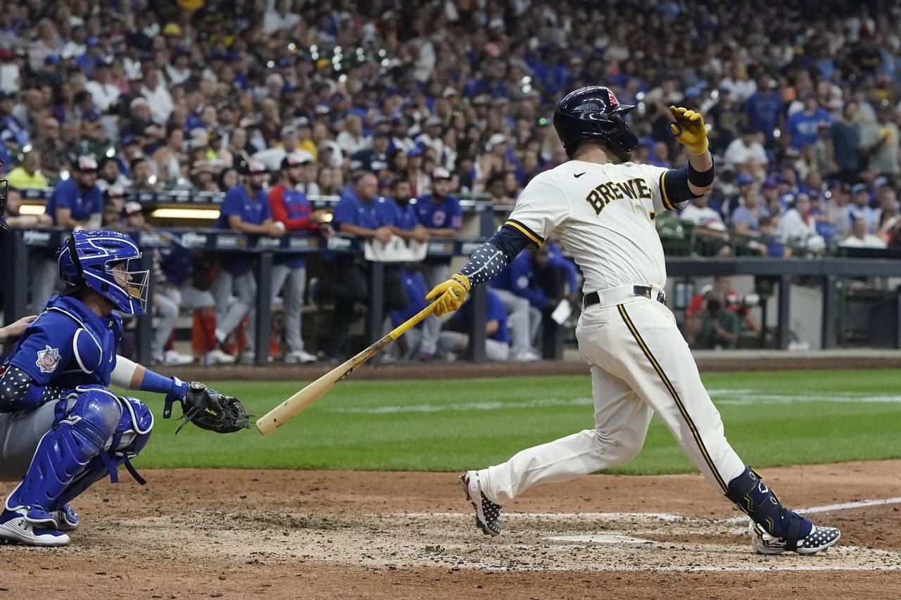 Milwaukee Brewers' Victor Caratini hits a walk off three run home run during the 10th inning of a b...