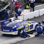 
              NASCAR Cup Series driver Chase Elliott (9), who won the race, makes a pit stop at a NASCAR Cup Series auto race at Atlanta Motor Speedway in Hampton, Ga., on Sunday, July 10, 2022. (AP Photo/Bob Andres)
            