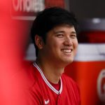 
              Los Angeles Angels designated hitter Shohei Ohtani sits in the dugout during the fourth inning of a baseball game against the Baltimore Orioles, Sunday, July 10, 2022, in Baltimore. (AP Photo/Julio Cortez)
            