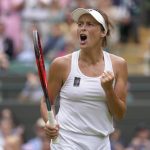 
              Germany's Tatjana Maria reacts after winning a rally against Germany's Jule Niemeier in a women's singles quarterfinal match at the Wimbledon tennis championships in London, Tuesday July 5, 2022. (AP Photo/Kirsty Wigglesworth)
            