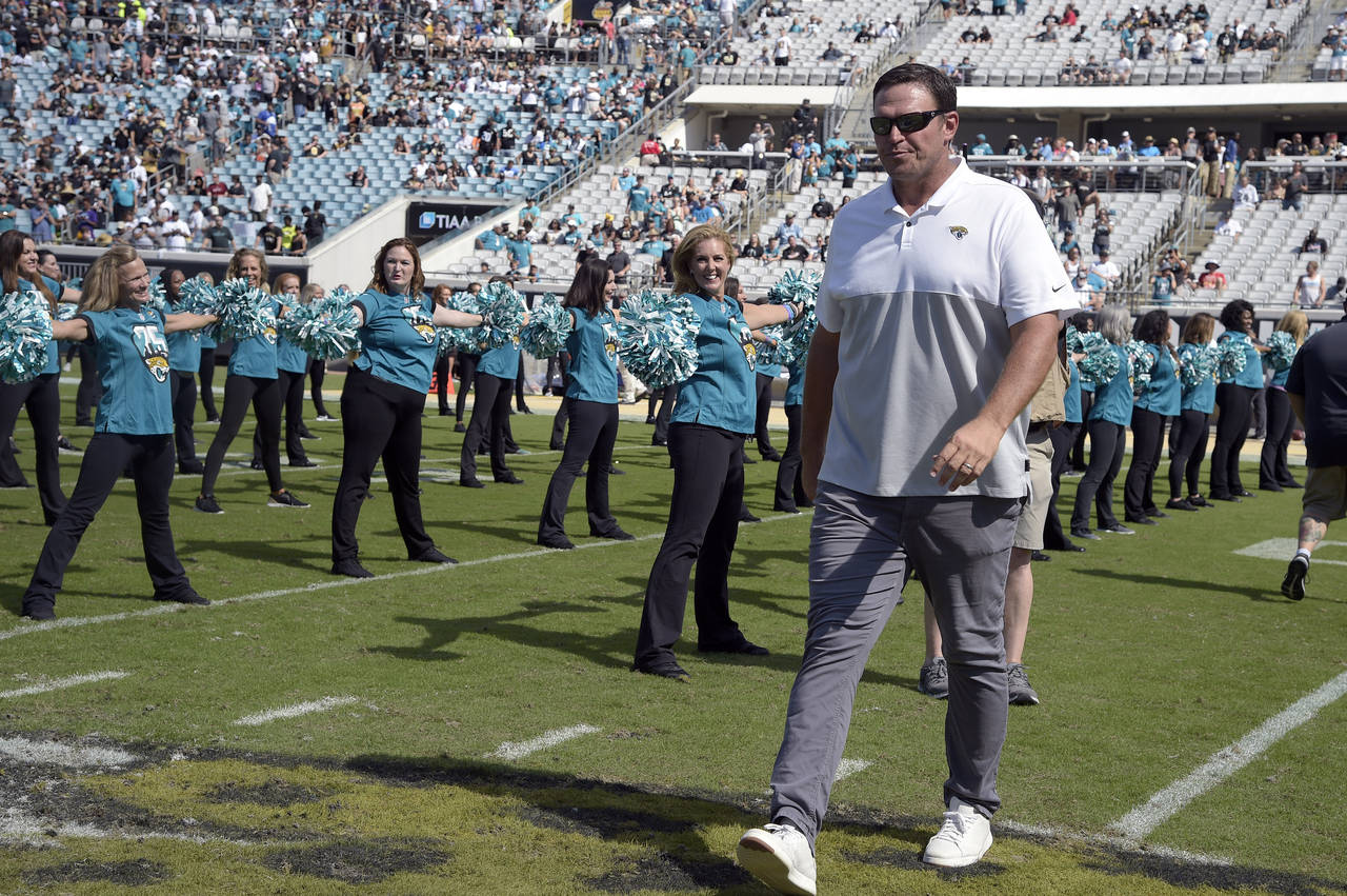 FILE - Former Jacksonville Jaguars player Tony Boselli is honored on the field during halftime of a...