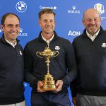 
              FILE -2023 Europe Ryder Cup golf captain Henrik Stenson, center, holds the Ryder Cup trophy as he poses for photos with his vice captains Edoardo Molinari, left, and Thomas Bjorn, at the end of a press conference at the Marco Simone golf club, in Guidonia Montecelio, outskirts of Rome, Italy, Monday, May 30, 2022.  Stenson was removed as Ryder Cup captain for Europe, Wednesday, July 20, 2022, choosing guaranteed money offered by a Saudi-funded rival league over leading his team in the most celebrated event on the European tour schedule .(AP Photo/Andrew Medichini, File)
            