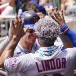 
              New York Mets' Mark Canha (19) celebrates with Francisco Lindor (12) after hitting a home run in the sixth inning of a baseball game against the Atlanta Braves Wednesday, July 13, 2022, in Atlanta. (AP Photo/John Bazemore)
            
