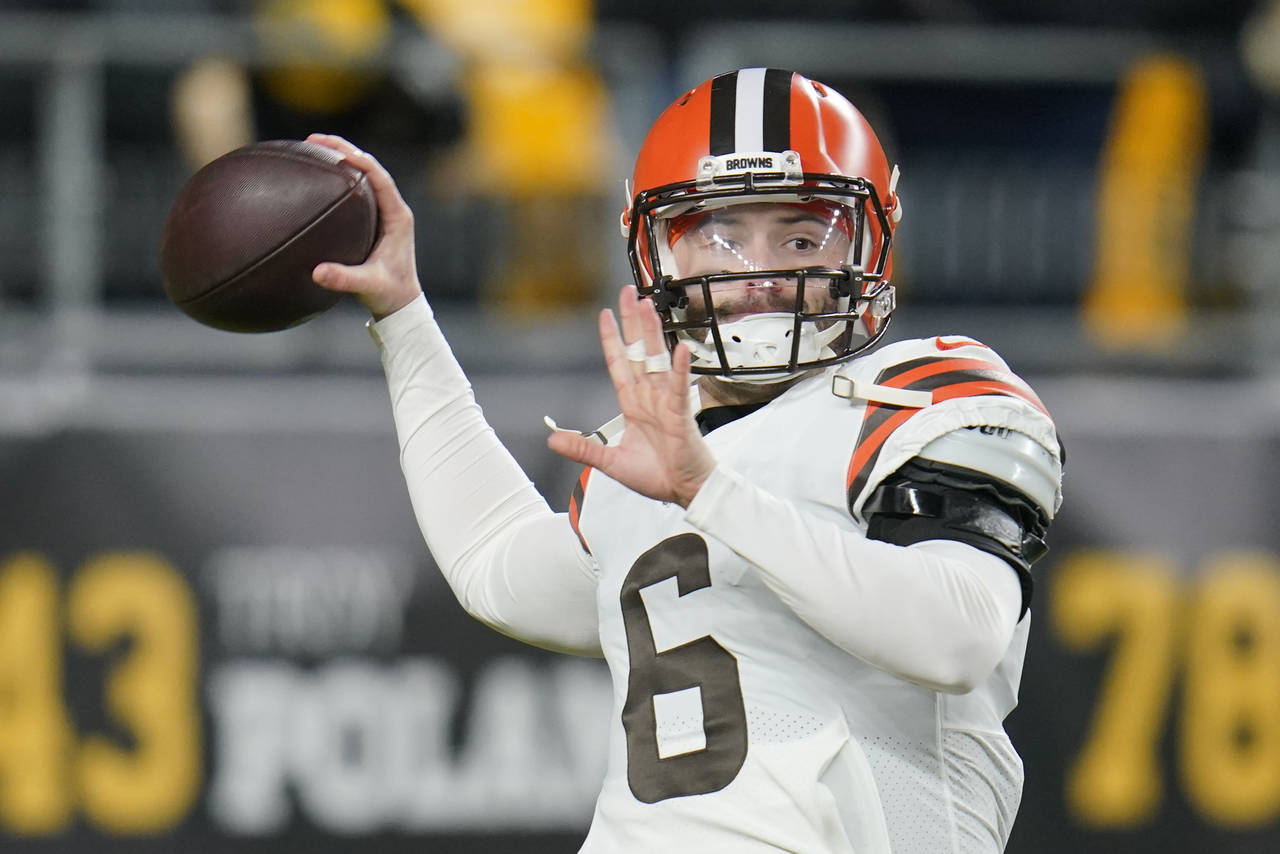 FILE - Cleveland Browns quarterback Baker Mayfield (6) warms up before an NFL football game against...