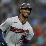 
              Minnesota Twins' Byron Buxton reacts after hitting a home run during the fourth inning of a baseball game against the San Diego Padres, Friday, July 29, 2022, in San Diego. (AP Photo/Gregory Bull)
            