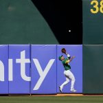 
              Oakland Athletics center fielder Ramon Laureano catches a fly ball hit by Detroit Tigers' Akil Baddoo during the third inning of the second baseball game of a doubleheader in Oakland, Calif., Thursday, July 21, 2022. (AP Photo/Godofredo A. Vásquez)
            