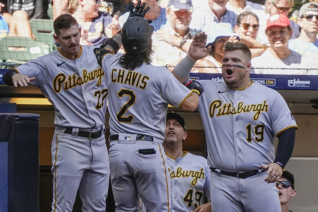 Pittsburgh Pirates' Michael Chavis is congratulated after hitting a home run during the sixth innin...