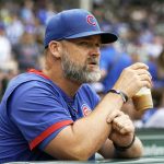 
              Chicago Cubs manager David Ross looks to the field before the first baseball game of a doubleheader against the New York Mets in Chicago, Saturday, July 16, 2022. (AP Photo/Nam Y. Huh)
            