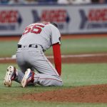 
              Boston Red Sox pitcher Matt Strahm kneels on the field during the sixth inning of a baseball game against the Tampa Bay Rays Tuesday July 12, 2022, in St. Petersburg, Fla. (AP Photo/Scott Audette)
            