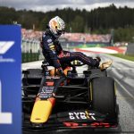 
              Red Bull driver Max Verstappen of the Netherlands leaves the car after winning the Sprint Race qualifying session at the Red Bull Ring racetrack in Spielberg, Austria, Saturday, July 9, 2022. The Austrian F1 Grand Prix will be held on Sunday July 10, 2022. (Christian Bruna/Pool via AP)
            