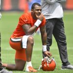 
              FILE - Cleveland Browns quarterback Deshaun Watson kneels on the field during an NFL football practice at the team's training facility on June 8, 2022, in Berea, Ohio. Thirty women who had accused the Houston Texans of turning a blind eye to allegations that Watson was sexually assaulting and harassing women during massage sessions have settled their legal claims against the team, their attorney said Friday, July 15, 2022. Watson, who has since been traded to the Cleveland Browns, has denied any wrongdoing and vowed to clear his name.  (AP Photo/David Richard, File)
            