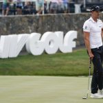 
              Henrik Stenson watches play on the 18th hole during the first round of the Bedminster Invitational LIV Golf tournament in Bedminster, N.J., Friday, July 29, 2022. (AP Photo/Seth Wenig)
            