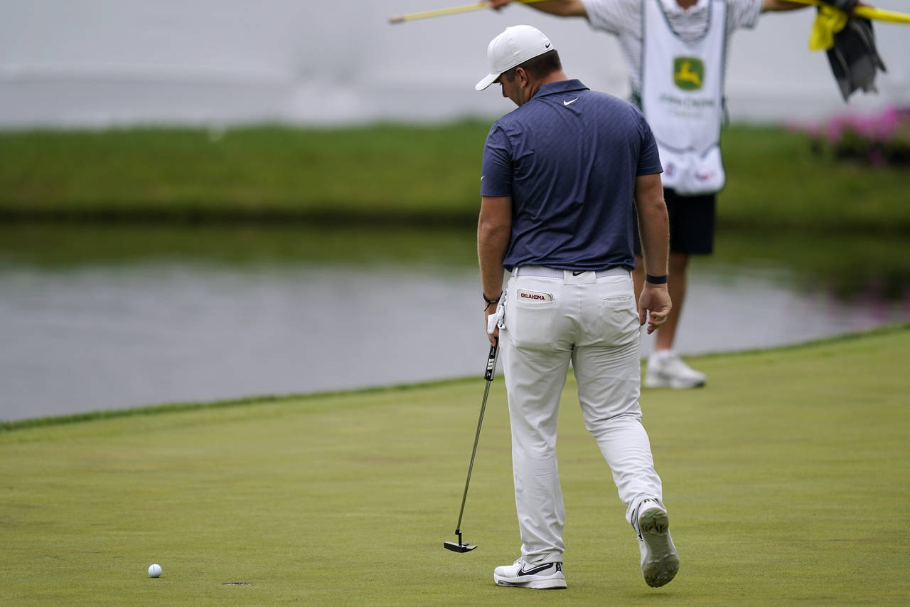 Christopher Gotterup looks at his missed putt on the 18th green during the second round of the John...