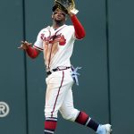 
              Atlanta Braves right fielder Ronald Acuna Jr. (13) catches a fly ball from New York Mets' Tomas Nido in the eighth inning of a baseball game, Wednesday, July 13, 2022, in Atlanta. (AP Photo/John Bazemore)
            