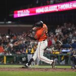 
              San Francisco Giants' Mike Yastrzemski hits a grand slam against the Milwaukee Brewers during the ninth inning of a baseball game in San Francisco, Friday, July 15, 2022. The Giants won 8-5. (AP Photo/Godofredo A. Vásquez)
            