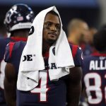 
              FILE - Houston Texans' Deshaun Watson (4) walks along the sideline in the first half of a preseason NFL football game against the Dallas Cowboys in Arlington, Texas, on Aug. 24, 2019. Thirty women who had accused the Houston Texans of turning a blind eye to allegations that Watson was sexually assaulting and harassing women during massage sessions have settled their legal claims against the team, their attorney said Friday, July 15, 2022. Watson, who has since been traded to the Cleveland Browns, has denied any wrongdoing and vowed to clear his name. (AP Photo/Michael Ainsworth, File)
            