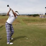 
              England's Ian Poulter tees off on the 6th hole during a practice day at the Old Course, at St. Andrews, Scotland, Monday July 11, 2022. The Open Championship returns to the home of golf on July 14-17, 2022, to celebrate the 150th edition of the sport's oldest championship, which dates to 1860 and was first played at St. Andrews in 1873. (Richard Sellers/PA via AP)
            