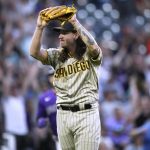 
              San Diego Padres starting pitcher Mike Clevinger reacts after giving up a three-run home run to Colorado Rockies' Charlie Blackmon during the sixth inning of a baseball game Tuesday, July 12, 2022, in Denver. (AP Photo/David Zalubowski)
            