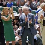 
              Former Wimbledon singles champions from left: John Newcombe, Chris Evert, Rod Laver and Bjorn Borg applaud during a 100 years of Centre Court celebration on day seven of the Wimbledon tennis championships in London, Sunday, July 3, 2022. (AP Photo/Kirsty Wigglesworth)
            