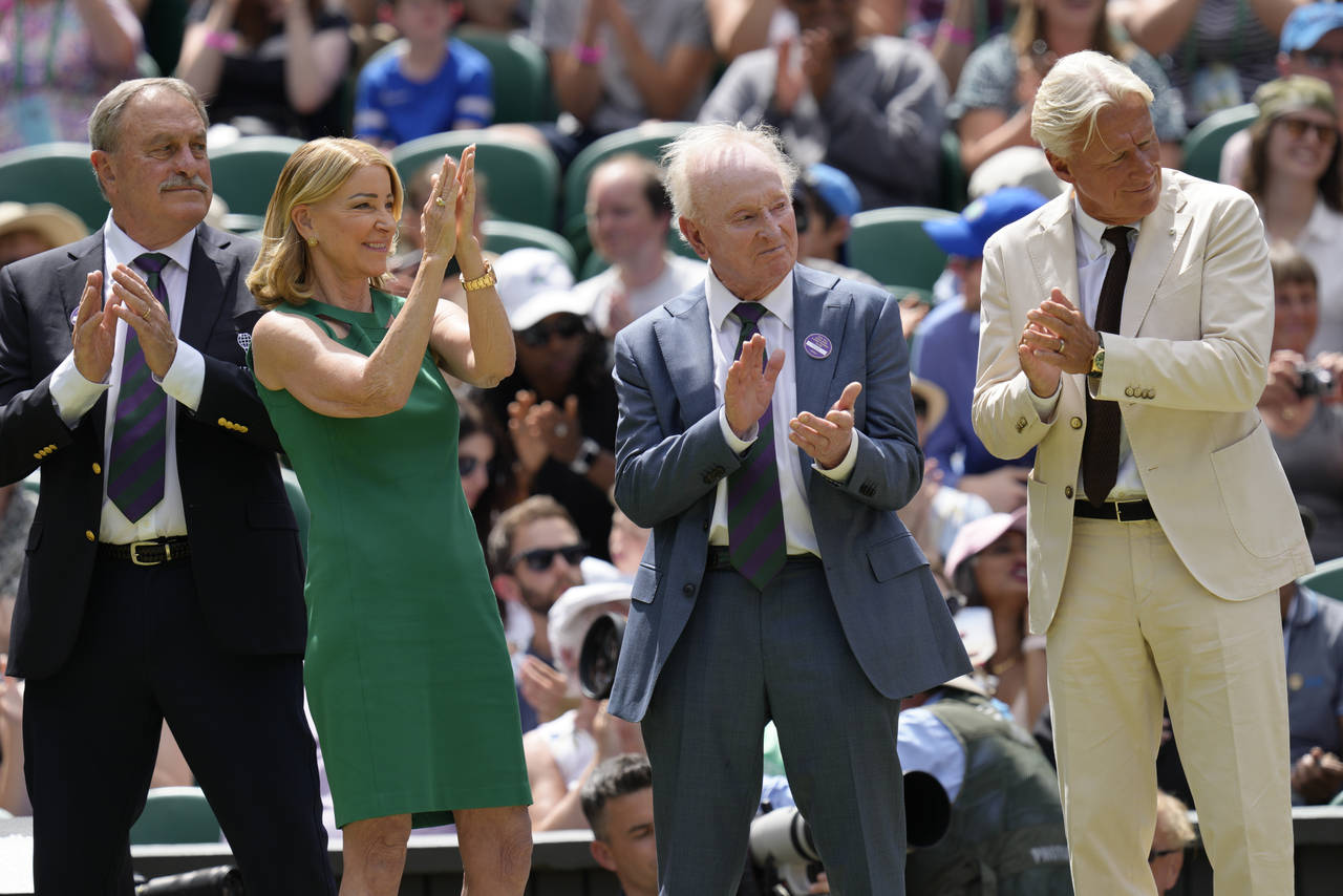 Former Wimbledon singles champions from left: John Newcombe, Chris Evert, Rod Laver and Bjorn Borg ...