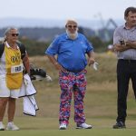 
              John Daly of the United States, center, and England's Nick Faldo stand on the 17th green during a 'Champions round' as preparations continue for the British Open golf championship on the Old Course at St. Andrews, Scotland, Monday July 11, 2022. The Open Championship returns to the home of golf on July 14-17, 2022, to celebrate the 150th edition of the sport's oldest championship, which dates to 1860 and was first played at St. Andrews in 1873. (AP Photo/Peter Morrison)
            