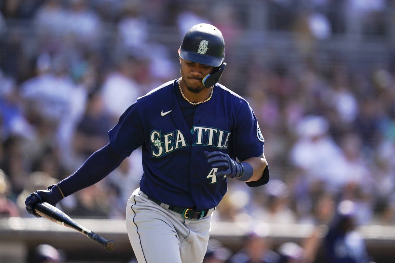 Seattle Mariners' Julio Rodriguez reacts after hitting a two-run home run during the fourth inning ...
