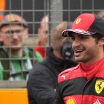
              Ferrari driver Carlos Sainz of Spain celebrates after he clocked the fastest time during the qualifying session for the British Formula One Grand Prix at the Silverstone circuit, in Silverstone, England, Saturday, July 2, 2022. The British F1 Grand Prix is held on Sunday July 3, 2022. (AP Photo/Frank Augstein)
            