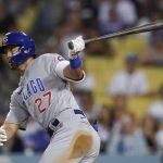 
              Chicago Cubs' Seiya Suzuki (27) singles during the fifth inning of a baseball game against the Los Angeles Dodgers in Los Angeles, Saturday, July 9, 2022. (AP Photo/Ashley Landis)
            